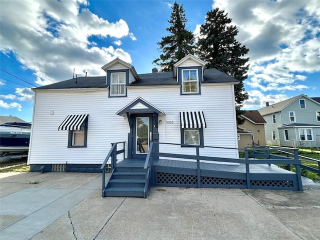 view of front of home featuring a wooden deck