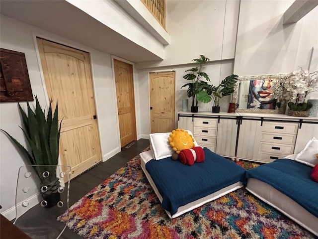 bedroom featuring dark hardwood / wood-style floors