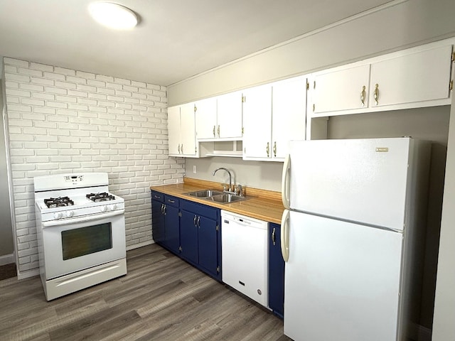 kitchen featuring sink, white appliances, white cabinetry, dark hardwood / wood-style floors, and blue cabinets