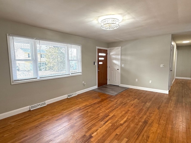 foyer with hardwood / wood-style flooring