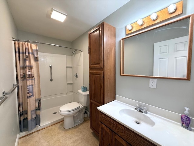 bathroom with vanity, curtained shower, and toilet