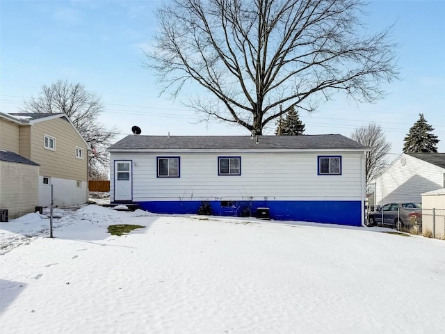 view of snow covered house