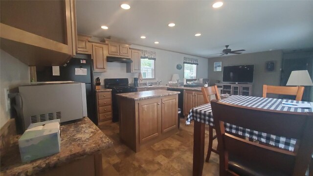 1644 Pinegrove Way, Erie, PA 16509 - kitchen with under cabinet range hood, recessed lighting, a kitchen island, ceiling fan, and black appliances