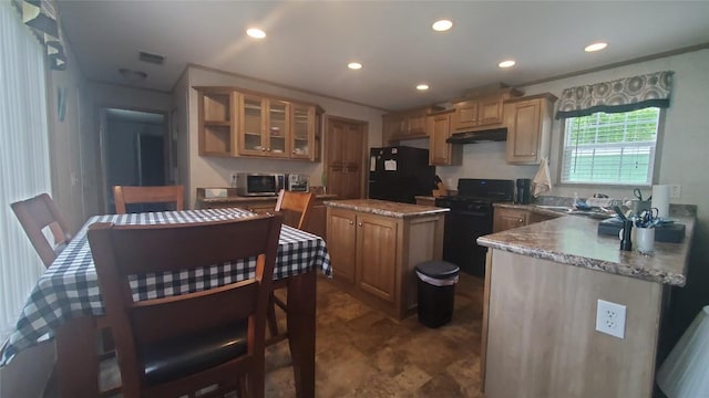 1644 Pinegrove Way, Erie, PA 16509 - kitchen with black appliances, under cabinet range hood, a center island, glass insert cabinets, and recessed lighting