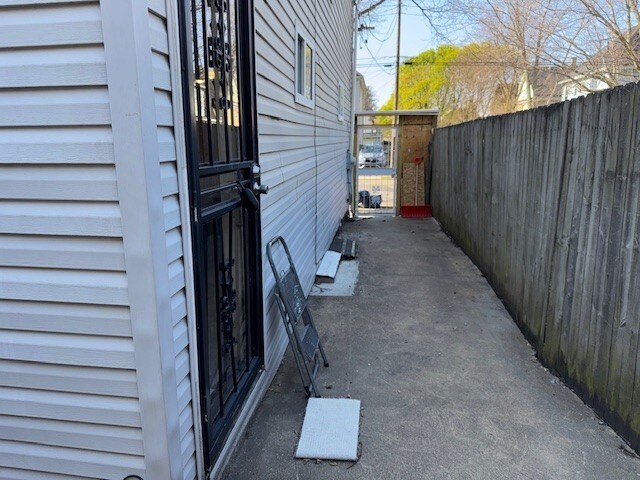 747 E 25th St, Erie, PA 16503 - view of side of property featuring fence