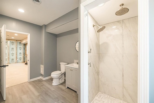 21720 Matthew Ln, Saegertown, PA 16433 - full bathroom with a marble finish shower, wood finished floors, vanity, and toilet