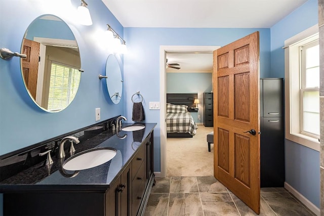 21720 Matthew Ln, Saegertown, PA 16433 - ensuite bathroom featuring double vanity and baseboards