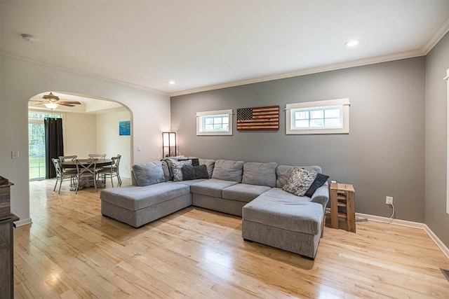 21720 Matthew Ln, Saegertown, PA 16433 - living area featuring arched walkways, healthy amount of natural light, crown molding, light wood-style floors, and recessed lighting