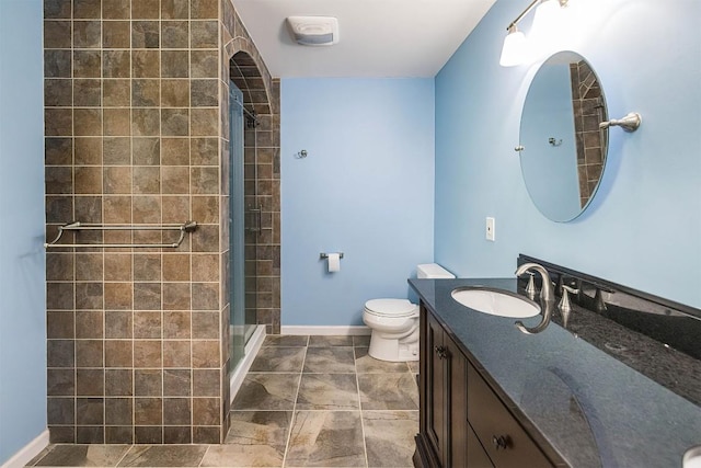 21720 Matthew Ln, Saegertown, PA 16433 - full bath with toilet, a tile shower, vanity, and baseboards