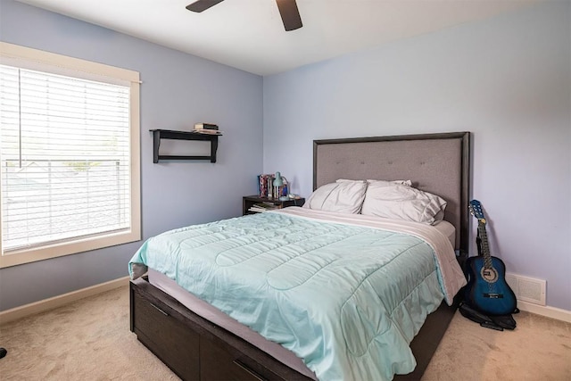 21720 Matthew Ln, Saegertown, PA 16433 - bedroom with light carpet, multiple windows, baseboards, and ceiling fan