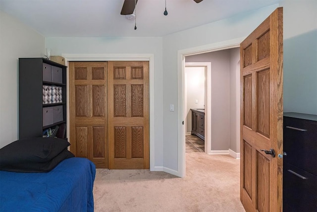 21720 Matthew Ln, Saegertown, PA 16433 - bedroom featuring light colored carpet, baseboards, ceiling fan, and a closet