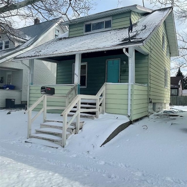 bungalow-style home with covered porch