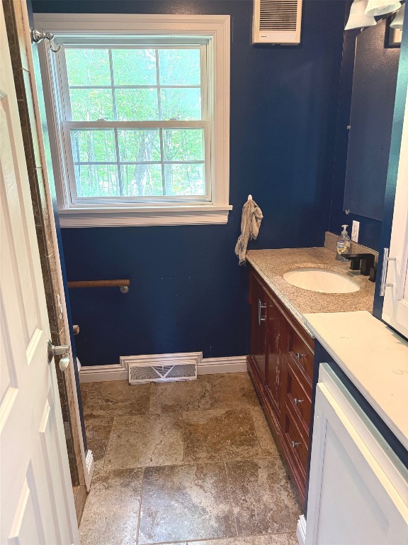 518 Spring St, Jamestown, PA 16134 - full bathroom with vanity and stone finish flooring