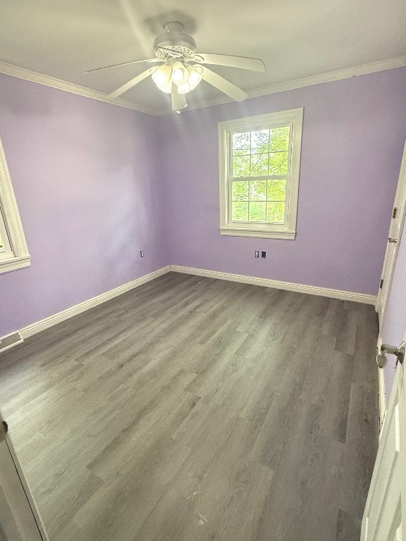 518 Spring St, Jamestown, PA 16134 - spare room with ornamental molding, ceiling fan, and wood finished floors