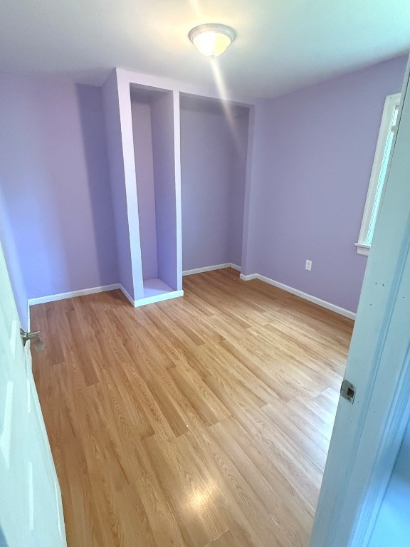 518 Spring St, Jamestown, PA 16134 - unfurnished bedroom featuring light wood finished floors and baseboards