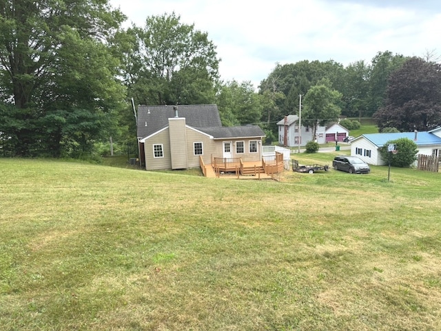 518 Spring St, Jamestown, PA 16134 - rear view of property featuring a wooden deck and a lawn