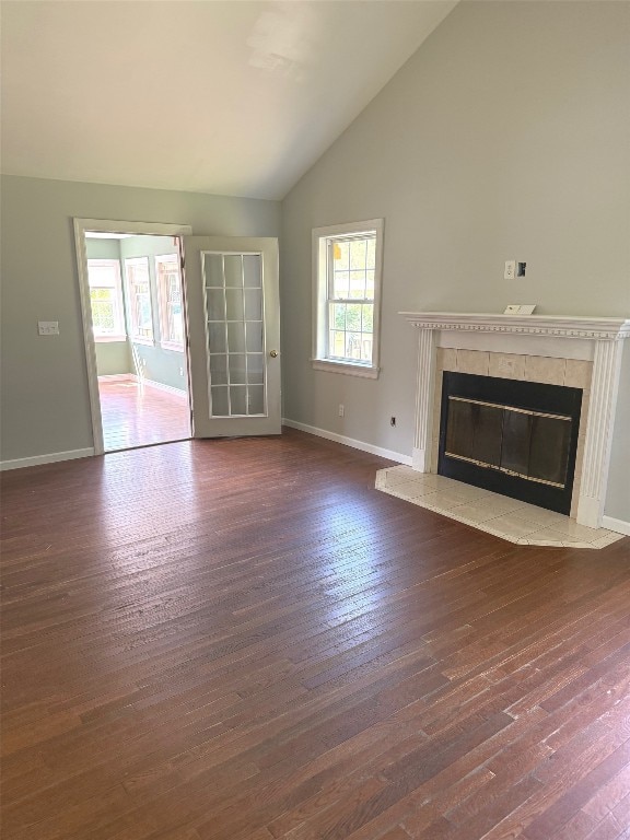 518 Spring St, Jamestown, PA 16134 - unfurnished living room featuring a premium fireplace, wood finished floors, and high vaulted ceiling