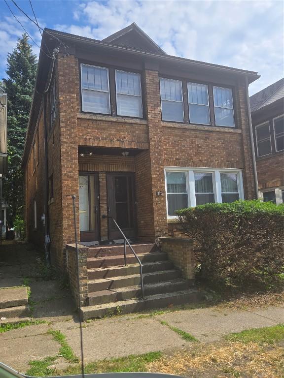 327 E 7th St, Erie, PA 16503 - view of front of home featuring brick siding