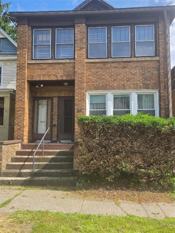 327 E 7th St, Erie, PA 16503 - view of front of home featuring brick siding