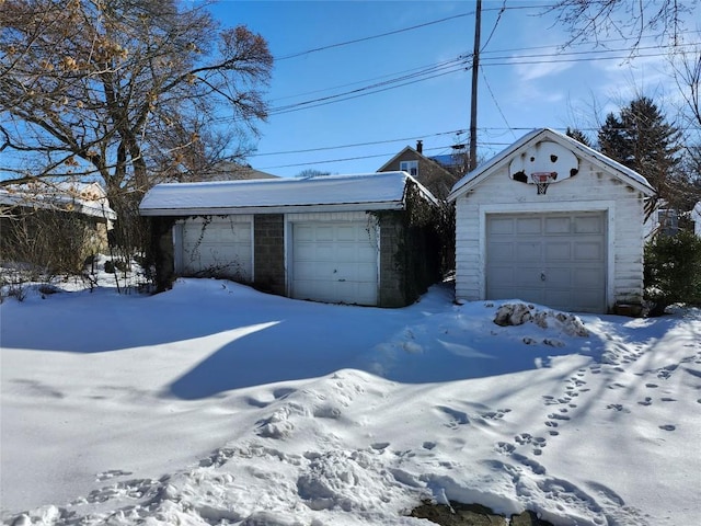 view of snow covered garage