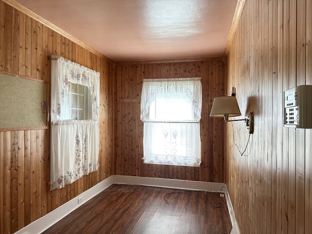 957 E 29th St, Erie, PA 16504 - spare room with wood finished floors, crown molding, and wooden walls