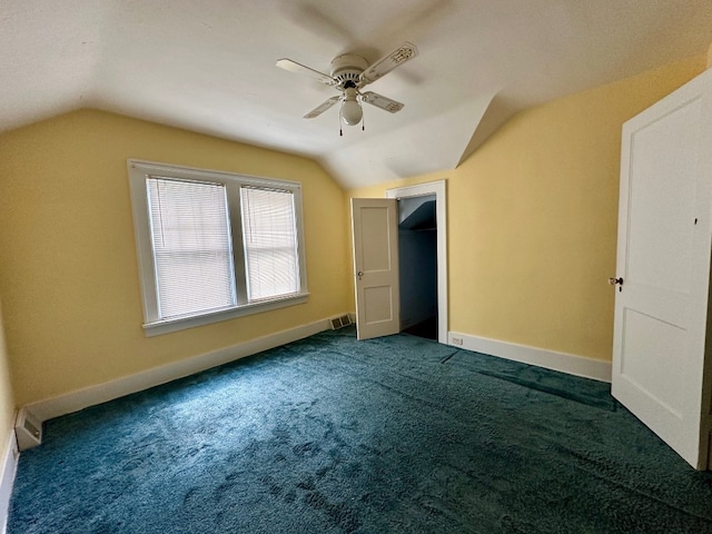 957 E 29th St, Erie, PA 16504 - unfurnished bedroom featuring vaulted ceiling, carpet, a closet, and a ceiling fan