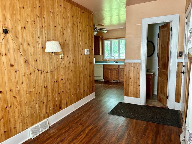 957 E 29th St, Erie, PA 16504 - hall with dark wood finished floors and wood walls