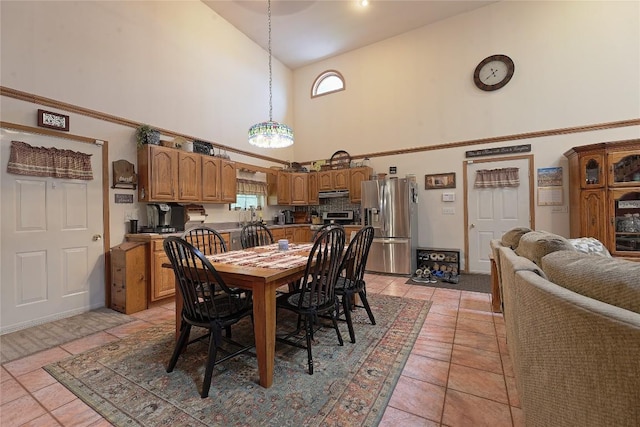 38753 Centerville Rd, Centerville, PA 16404 - dining room featuring high vaulted ceiling, light tile patterned floors, and a chandelier