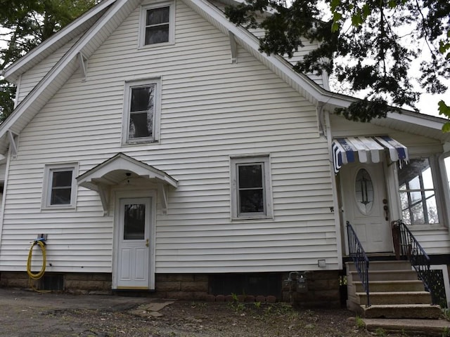 view of front of home with entry steps