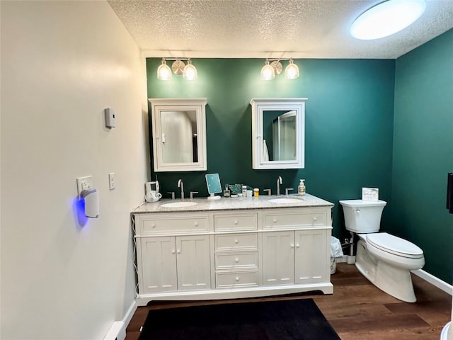 112 Willadell Rd, Pa, PA 16154 - full bath with a textured ceiling, double vanity, and wood finished floors