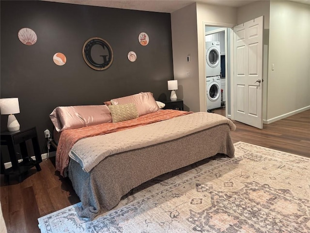 112 Willadell Rd, Pa, PA 16154 - bedroom with stacked washer / dryer, wood finished floors, and an accent wall