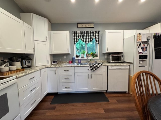 112 Willadell Rd, Pa, PA 16154 - kitchen with white appliances, dark wood-type flooring, white cabinets, light stone counters, and recessed lighting