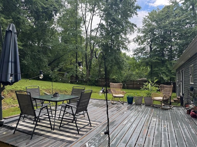 112 Willadell Rd, Pa, PA 16154 - wooden terrace featuring outdoor dining area, a fenced backyard, and view of scattered trees