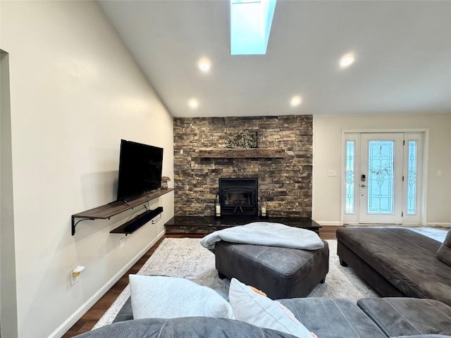 112 Willadell Rd, Pa, PA 16154 - living room featuring vaulted ceiling, a wood stove, wood finished floors, and recessed lighting