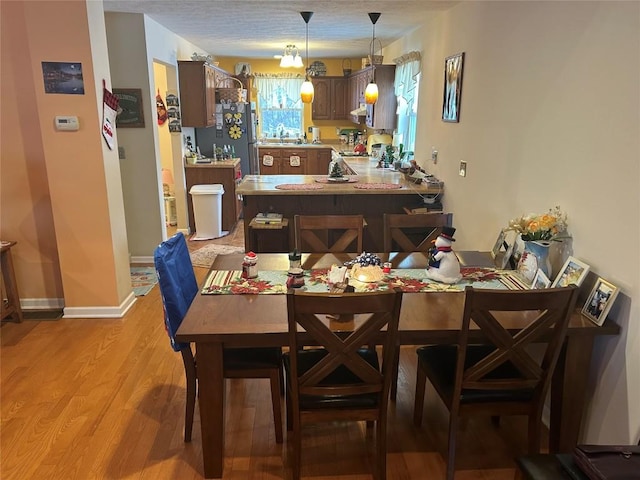 dining area featuring light hardwood / wood-style flooring