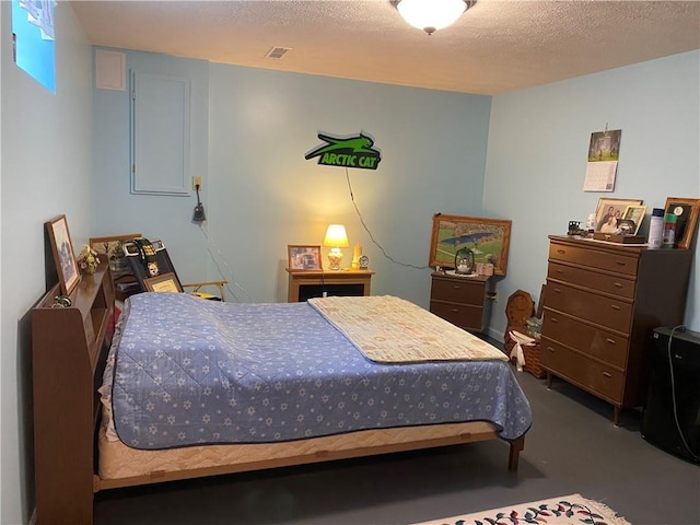 bedroom with a textured ceiling