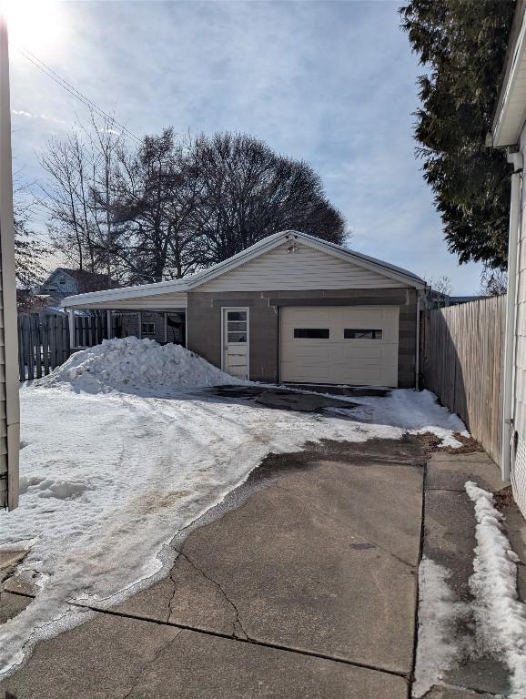 view of snow covered garage