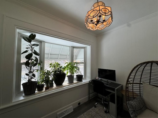 office featuring ornamental molding, hardwood / wood-style floors, and a chandelier