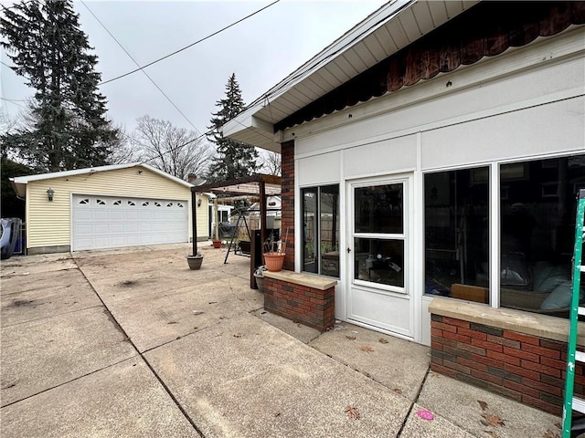 exterior space with a garage and an outdoor structure