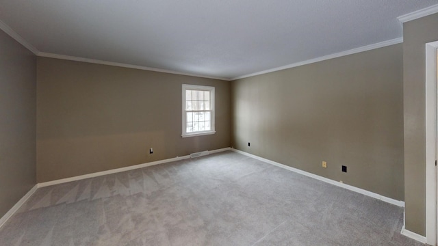 carpeted empty room with ornamental molding