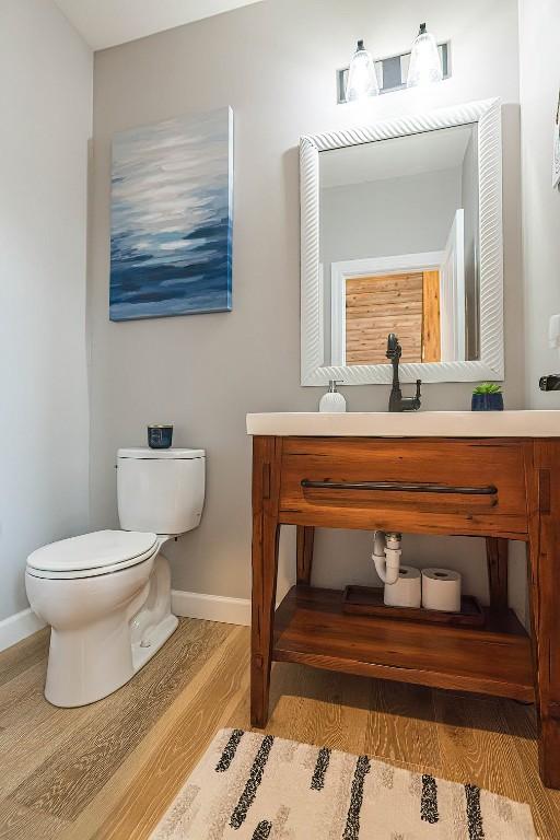 7662 Magnolia Bnd, Fairview, PA 16415 - bathroom featuring wood finished floors and vanity