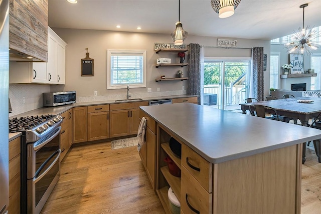 7662 Magnolia Bnd, Fairview, PA 16415 - kitchen featuring open shelves, stainless steel appliances, a center island, plenty of natural light, and recessed lighting