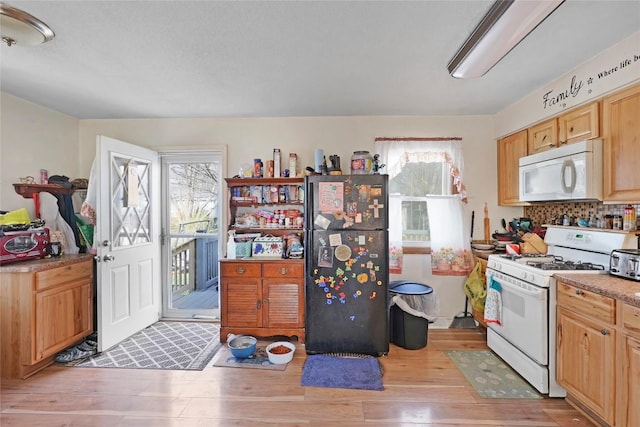 221 Pheasant Dr, Girard, PA 16417 - kitchen with decorative backsplash, light wood-style flooring, white appliances, and a wealth of natural light
