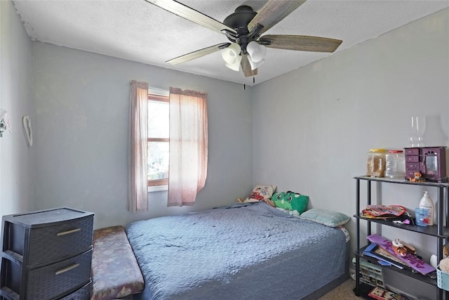 221 Pheasant Dr, Girard, PA 16417 - bedroom with ceiling fan and a textured ceiling