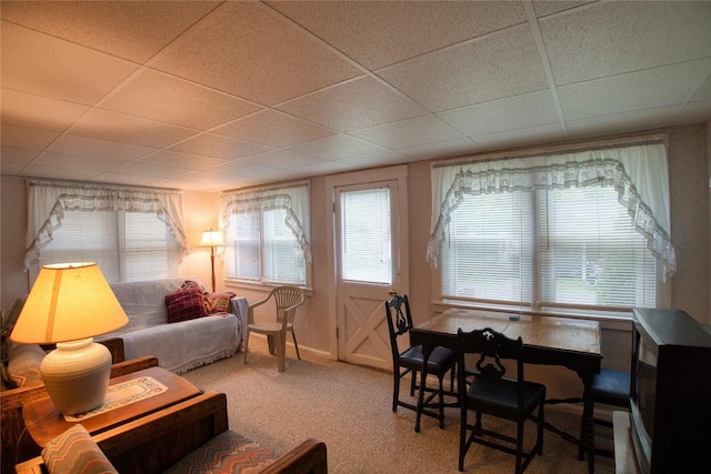 12199 Mantor St, Conneaut Lake, PA 16316 - living area with a paneled ceiling, baseboards, and carpet floors