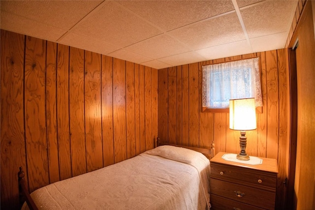 12199 Mantor St, Conneaut Lake, PA 16316 - bedroom with wooden walls and a paneled ceiling