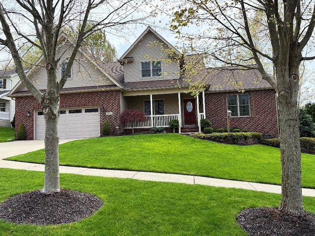 view of front of property featuring a garage, covered porch, a front yard, brick siding, and concrete driveway