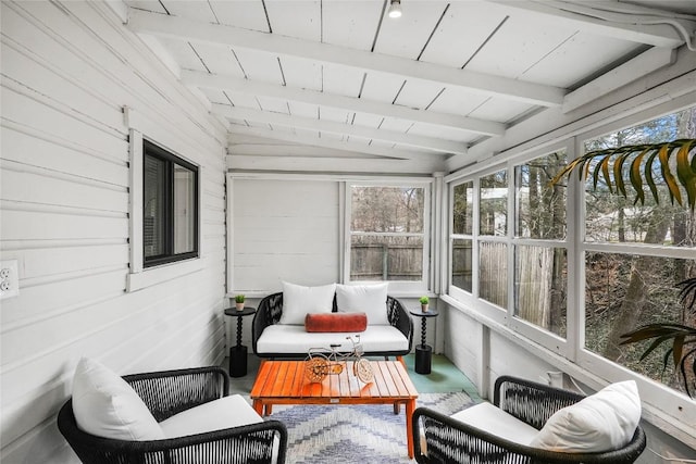 sunroom / solarium with beamed ceiling