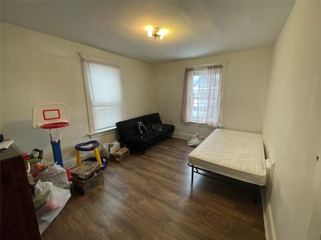 bedroom featuring dark hardwood / wood-style floors