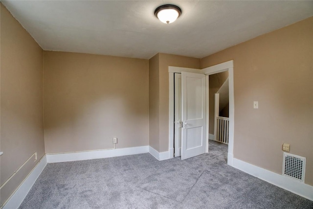 1032 Newton Ave, Erie, PA 16511 - carpeted empty room with baseboards
